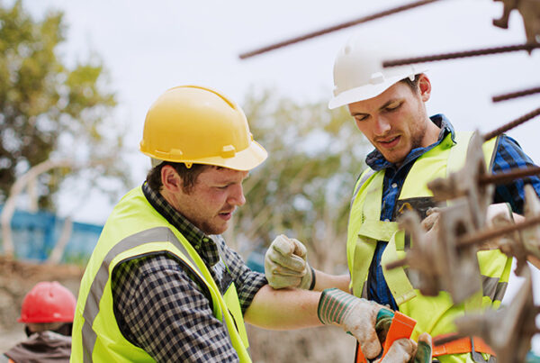 Photograph of multiple construction workers on a construction site